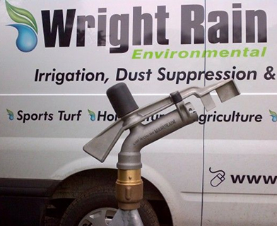 Manurain sprinkler in front of Wright Rain vehicle
